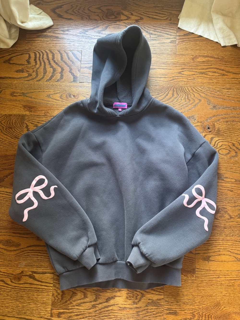 Edikted Women's Charcoal Gray Hoodie Sweater with Pink Ribbon Details